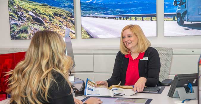 Travel Agent assisting a Member with a trip